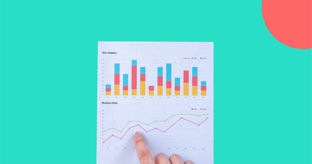 finger pointing at growth graphs.