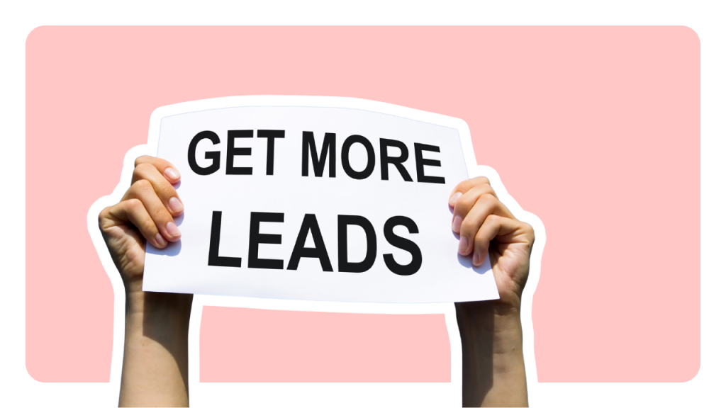 Person holding a paper with get more leads written.